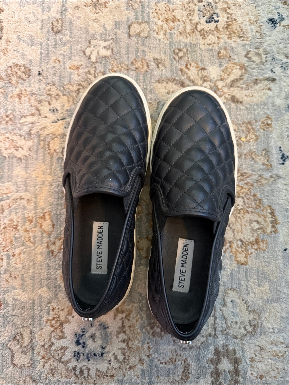 Steve Madden Quilted Slip-On Sneakers in Black and White